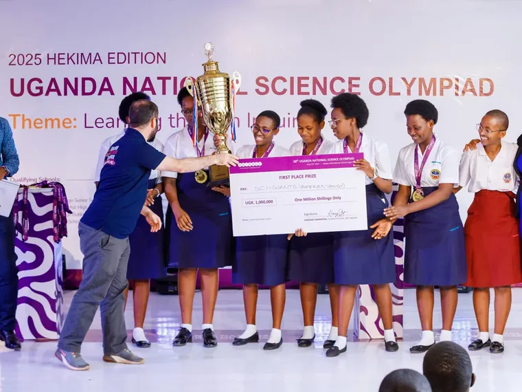 Students receiving recognition at the Uganda National Science Olympiad